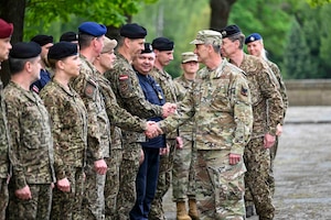 Air Force Gen. Steve Nordhaus, chief, National Guard Bureau, joins Maj. Gen. Kaspars Pudans, chief of defense for the Republic of Latvia, for a ceremonial wreath laying at the Riga Brethren Cemetery to honor Latvians who gave their lives for their country’s independence, Riga, Latvia, June 2, 2026.