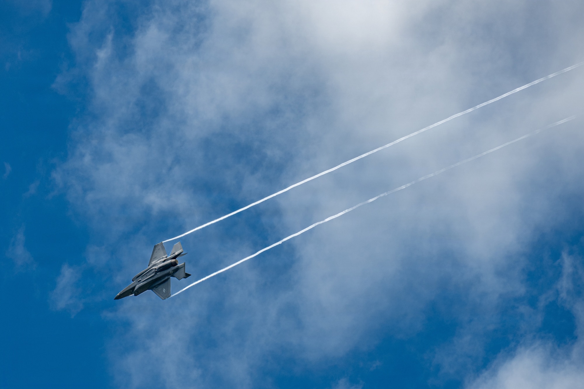 A U.S. Air Force F-35A Lightning II assigned to the 13th Fighter Squadron conducts a final approach before landing.