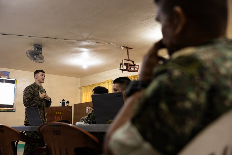 U.S. Marine Corps Capt. Remington Mederos, an artillery officer with Air Naval Gunfire Liaison Company Detachment - North, Marine Rotational Force – Southeast Asia, I Marine Expeditionary Force, instructs Philippine marines during a bilateral fires and effects training for Archipelagic Coastal Defense Continuum 26.3 on Fort Bonifacio, Philippines, June 3, 2026.