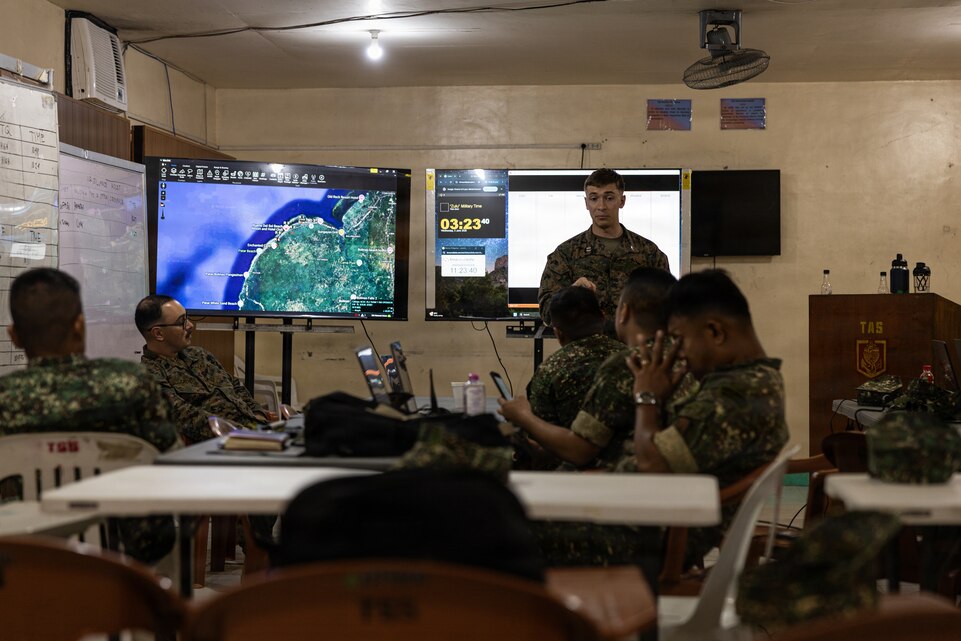 U.S. Marines with Air Naval Gunfire Liaison Company Detachment - North, Marine Rotational Force – Southeast Asia, I Marine Expeditionary Force, instruct Philippine marines during a bilateral fires and effects training for Archipelagic Coastal Defense Continuum 26.3 on Fort Bonifacio, Philippines, June 3, 2026.