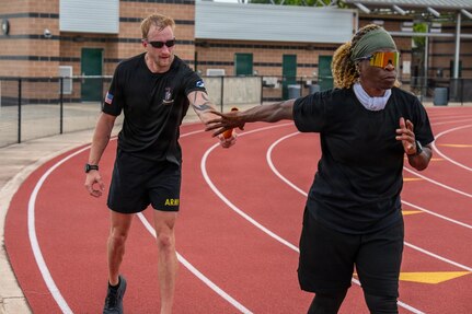 Team Army competitor participates in a track training event during their training camp in San Antonio, Texas, June 9, 2026. Team Army competitors train in adaptive sports as they prepare for the 2026 Warrior Games, June 13-20, 2026.