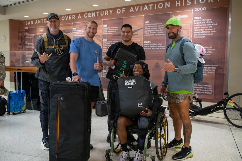 Team Army competitors pose for a group photo after arriving at San Antonio International Airport for the 2026 Warrior Games June 8, 2026.