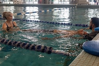U.S. Army Spc. Jeyson Ruiz participates in swimming drill with assistance from Krista Argiolas, a Team Army Recovery Consultant, and Eli English, Fort Benning’s Adaptive Reconditioning Lead, at Team Army’s Warrior Games Training Camp in San Antonio, Texas, June 9, 2026