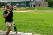 U.S. Army Staff Sgt. Gene Calantoc practices shot put during a field training event at Team Army’s Warrior Games Training Camp in San Antonio, Texas, June 9, 2026.