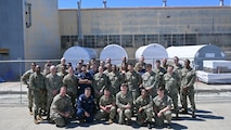 U.S. Navy Sailors and industry partners stand in front of Trident II D5 launch tubes during a tour of Portfolio Acquisition Executive (PAE) Strategic Systems Programs (SSP) Program Management Office (PMO) Flight Systems detachment in Sunnyvale, Calif., May 18-22, 2026. 

The tour was part of PAE SSP’s Reverse Strategic Weapons System (SWS) Week, which serves as an   educational training opportunity modeled after the regularly occurring SWS Weeks at submarine bases on the East and West Coasts. SWS Weeks bring ballistic missile submarine  and guided missile submarine crews, Navy support commands, and industry partners together to share new updates to the weapons system, troubleshoot issues, and forecast upcoming needs for the submarine fleet. Reverse SWS Weeks go a step further by bringing crew members out to PAE SSP’s PMOs and detachments – dispersed throughout the nation – providing an exclusive behind-the-scenes look at the weapons system they maintain and operate while on strategic patrol. (Courtesy Photo/Released)