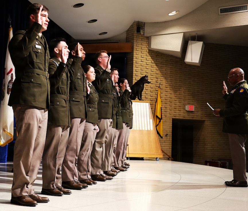 Maj. Gen. Rodney Boyd, The Adjutant General of Illinois and Commander of the Illinois National Guard, administers the Oath of Office to 10 new Army second lieutenants during Northern Illinois University’s Army ROTC Commissioning Ceremony.