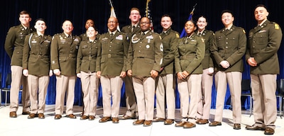 Maj. Gen. Rodney Boyd, The Adjutant General of Illinois and Commander of the Illinois National Guard, poses for a photograph with the Army’s 10 new second lieutenants after the Northern Illinois University’s Army ROTC Commissioning Ceremony.