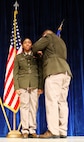 Staff Sgt. Anthony May pins second lieutenant rank on Knayjah Miller during Northern Illinois University’s Army ROTC Commissioning Ceremony, May 15.