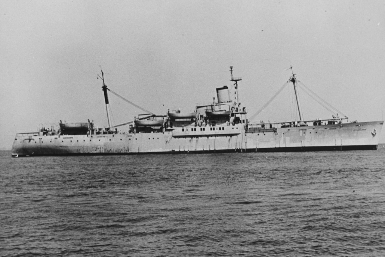 A large ship sails in the ocean.