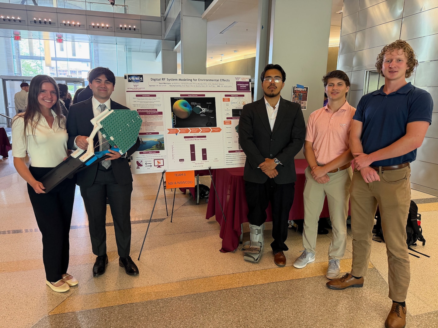 Virginia Tech College of Engineering students highlight their project at the college's Department of Engineering Education Interdisciplinary Expo April 29. (Photo courtesy of Robin Ott, Virginia Tech)