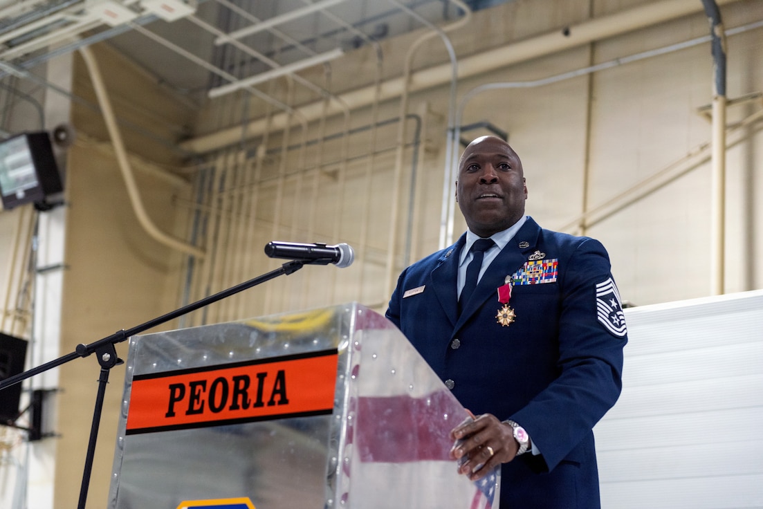 U.S. Air Force Chief Master Sgt. Marlon Burton, the command chief of the Illinois Air National Guard, addresses the audience during his retirement ceremony in Peoria, Illinois, May 3, 2026.
