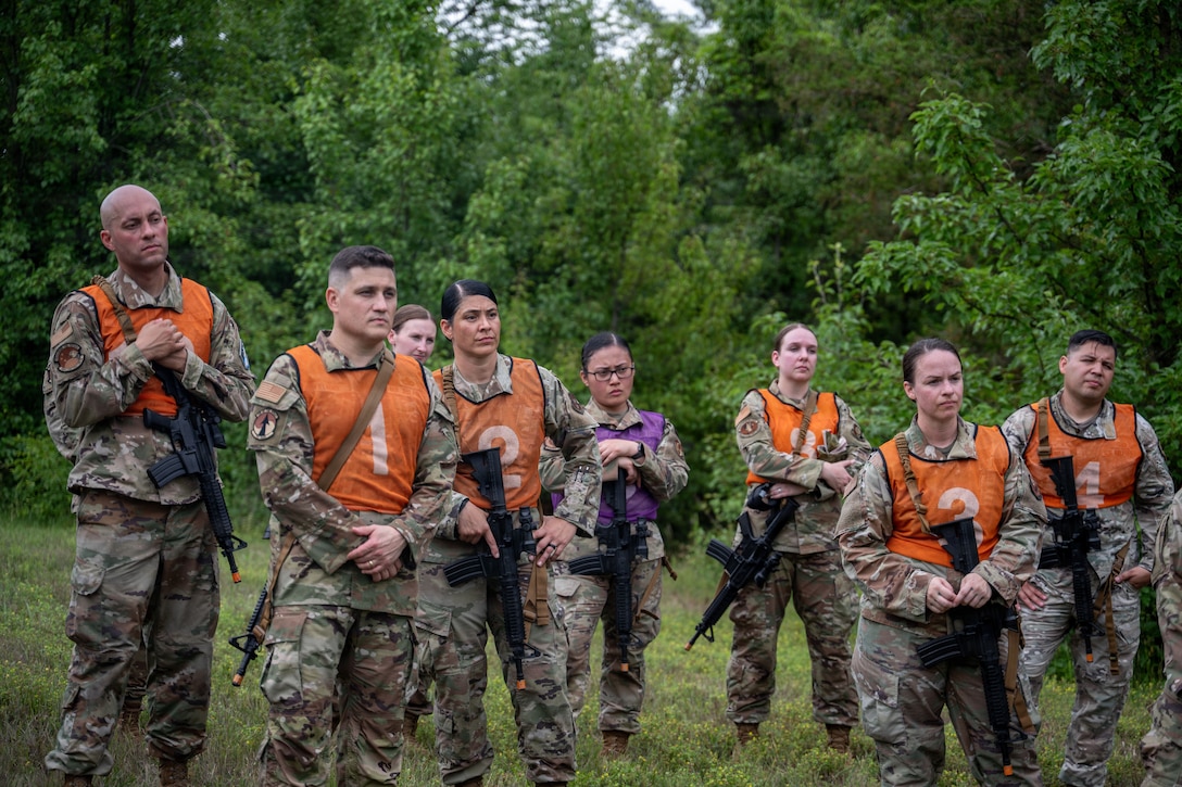 Photo of Airmen being briefed