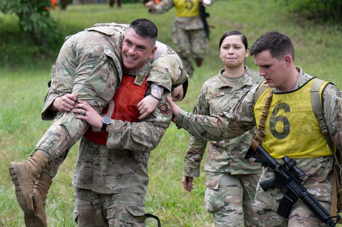 Photo of Airmen during a Tactical Combat Casualty Care scenario