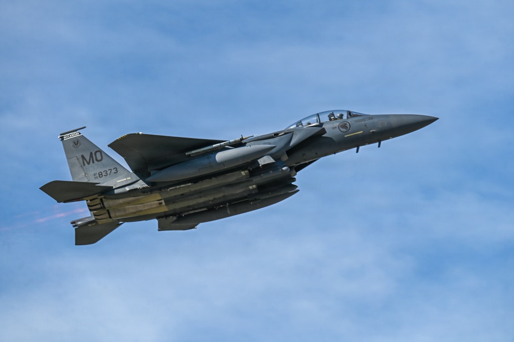 A F-15 Strike Eagle assigned to the 428th Fighter Squadron from Mountain Home Air Force Base, Idaho, soars above Eielson Air Force Base, Alaska, during RED FLAG-Alaska 26-2, June 1, 2026.