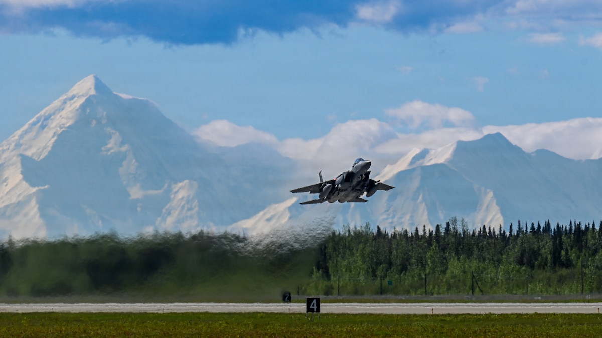 A F-15 Strike Eagle assigned to the 428th Fighter Squadron from Mountain Home Air Force Base, Idaho, takes off from the flight line at Eielson Air Force Base, Alaska, during RED FLAG-Alaska 26-2, June 1, 2026.