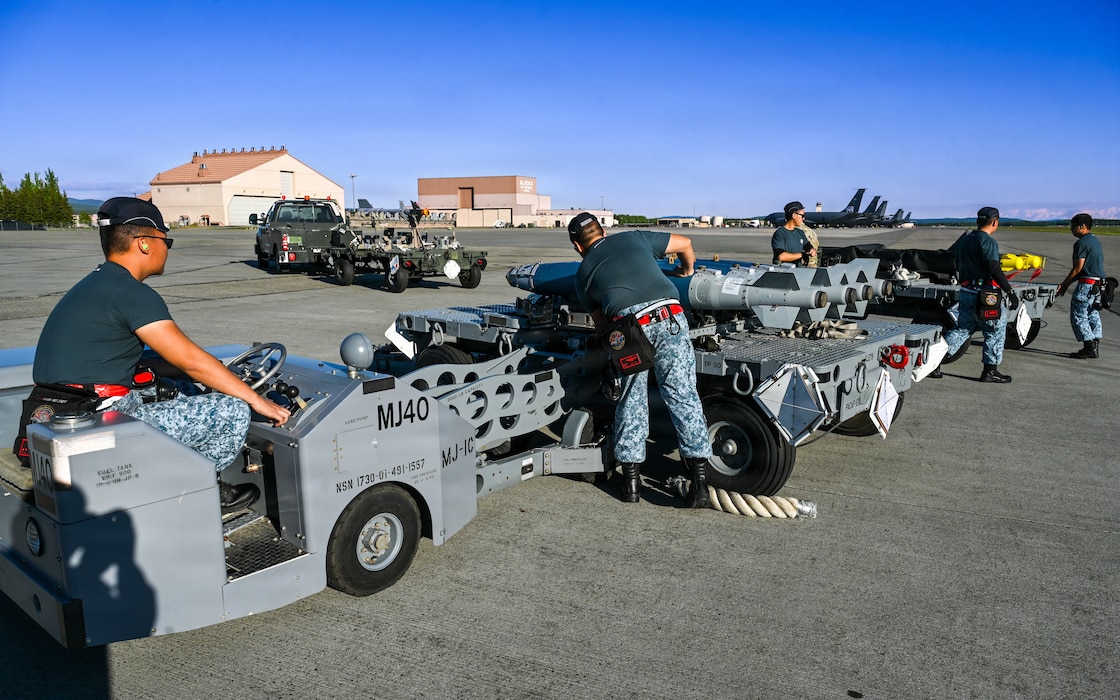 Republic of Singapore Air Force maintainers assigned to the 425th Fighter Squadron prepare munitions to be loaded onto F-16 Fighting Falcons on the flight line at Eielson Air Force Base, Alaska, during RED FLAG-Alask 26-2, June 3, 2026.