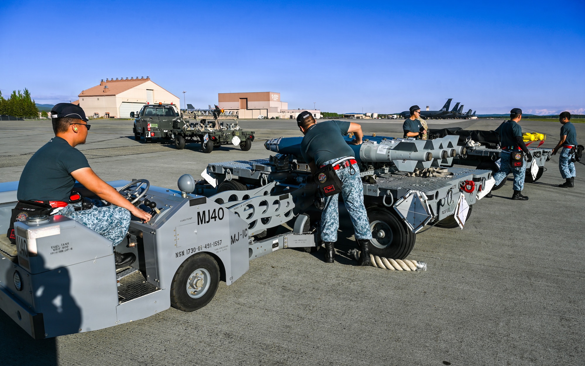 Republic of Singapore Air Force maintainers assigned to the 425th Fighter Squadron prepare munitions to be loaded onto F-16 Fighting Falcons on the flight line at Eielson Air Force Base, Alaska, during RED FLAG-Alask 26-2, June 3, 2026.