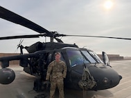 Illinois Army National Guard Chief Warrant Officer 2 Ethan R. Connor of Huntley, Ill., is shown on Al Asad Air Base in Iraq in 2023.
