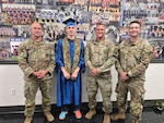 Sgt. 1st Class Ian Walker, Pvt. Logan May, Staff Sgt. Kolten Conant and Spc. Dustyn Sneider pose for a photo on May 22, 2026, at Midvale High School in Midvale, Idaho. Just five days before, May suffered a cardiac arrest during a fitness training event and Walker, Conant and Sneider worked together to revive May, which likely saved his life. Conant recruited May into the Idaho Army National Guard in April. Courtesy photo.