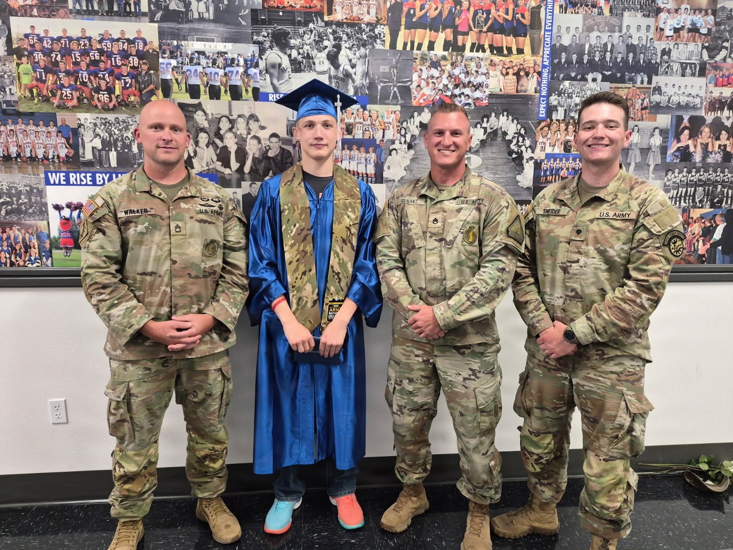 Sgt. 1st Class Ian Walker, Pvt. Logan May, Staff Sgt. Kolten Conant and Spc. Dustyn Sneider pose for a photo on May 22, 2026, at Midvale High School in Midvale, Idaho.