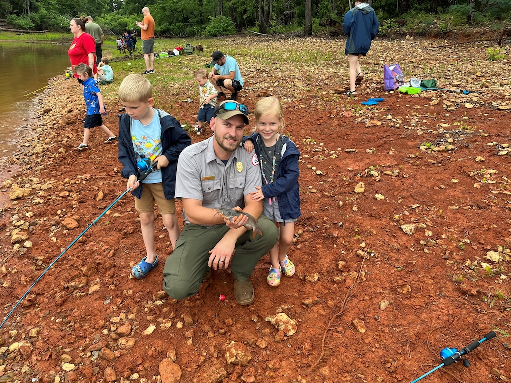 Ben Werner, natural resource specialist for the Savannah District, U.S. Army Corps of Engineers, poses for a photo with his two children during the Take Kids Fishing event May 23, 2026, at Modoc Fishing Pier on J. Strom Thurmond Lake in Modoc, South Carolina.