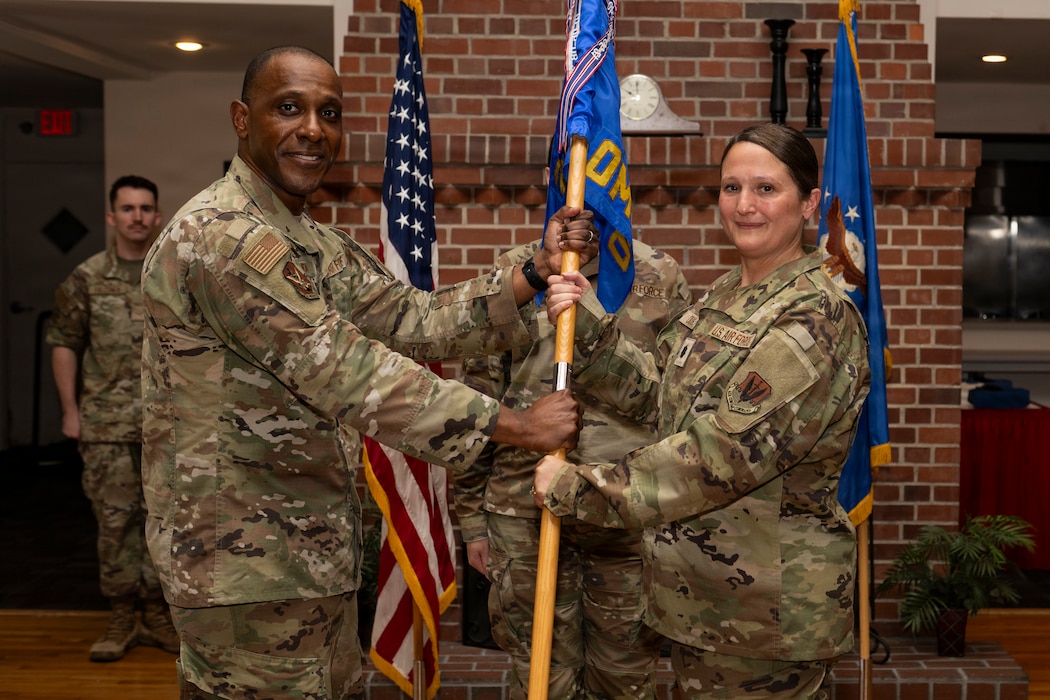A commander receiving a guidon.