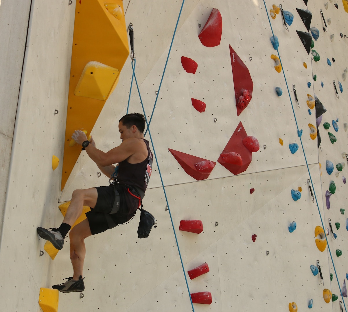 A man climbing a wall.
