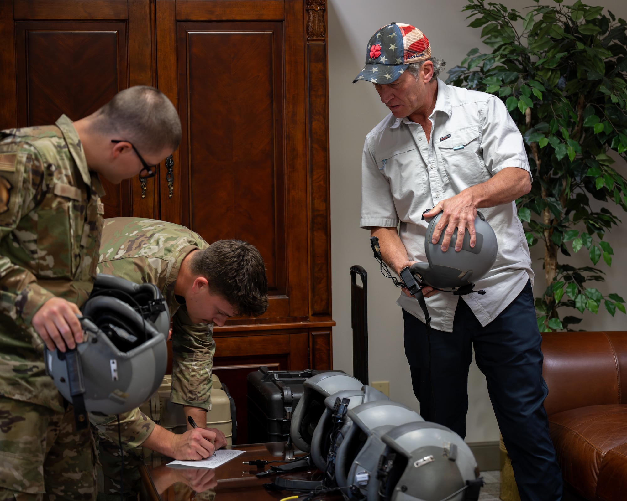 Aircrew flight equipment technicians assigned to the 1st Special Operations Wing issue flight gear to Rep. Ronny Jackson, Chairman of House Armed Services Subcommittee on Intelligence and Special Operations