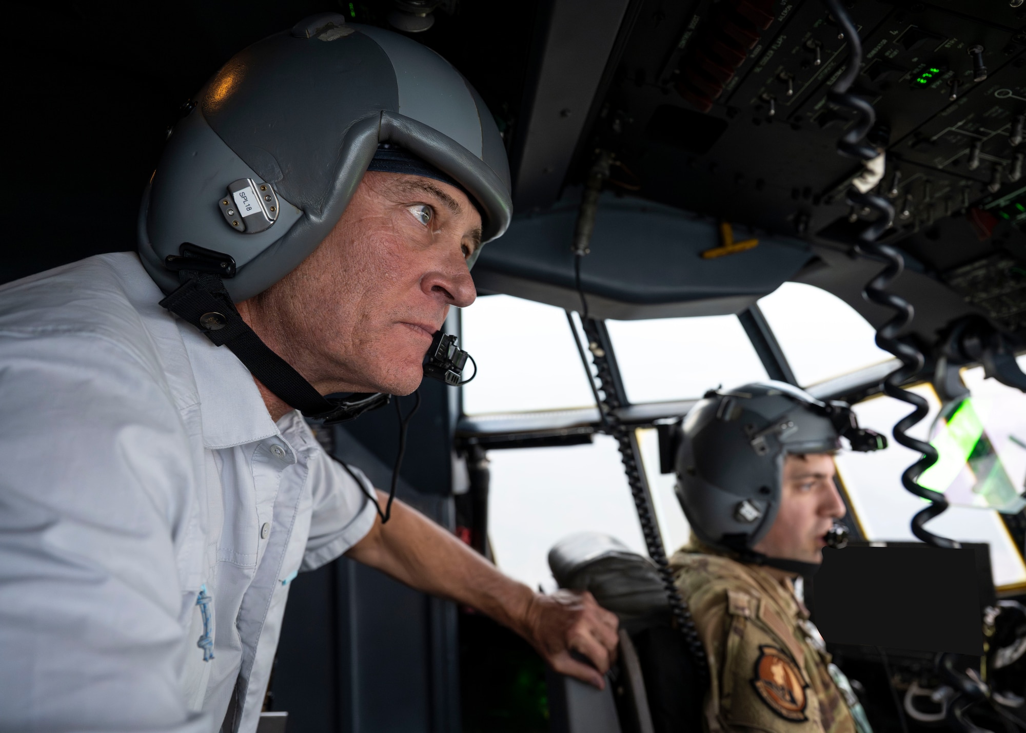 Rep. Ronny Jackson, Chairman of House Armed Services Subcommittee on Intelligence and Special Operations, observes pilots aboard an AC-130 Ghostrider
