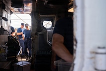 A photo of U.S. Coast Guardsmen aboard the U.S. Coast Guard Cutter Eagle.
