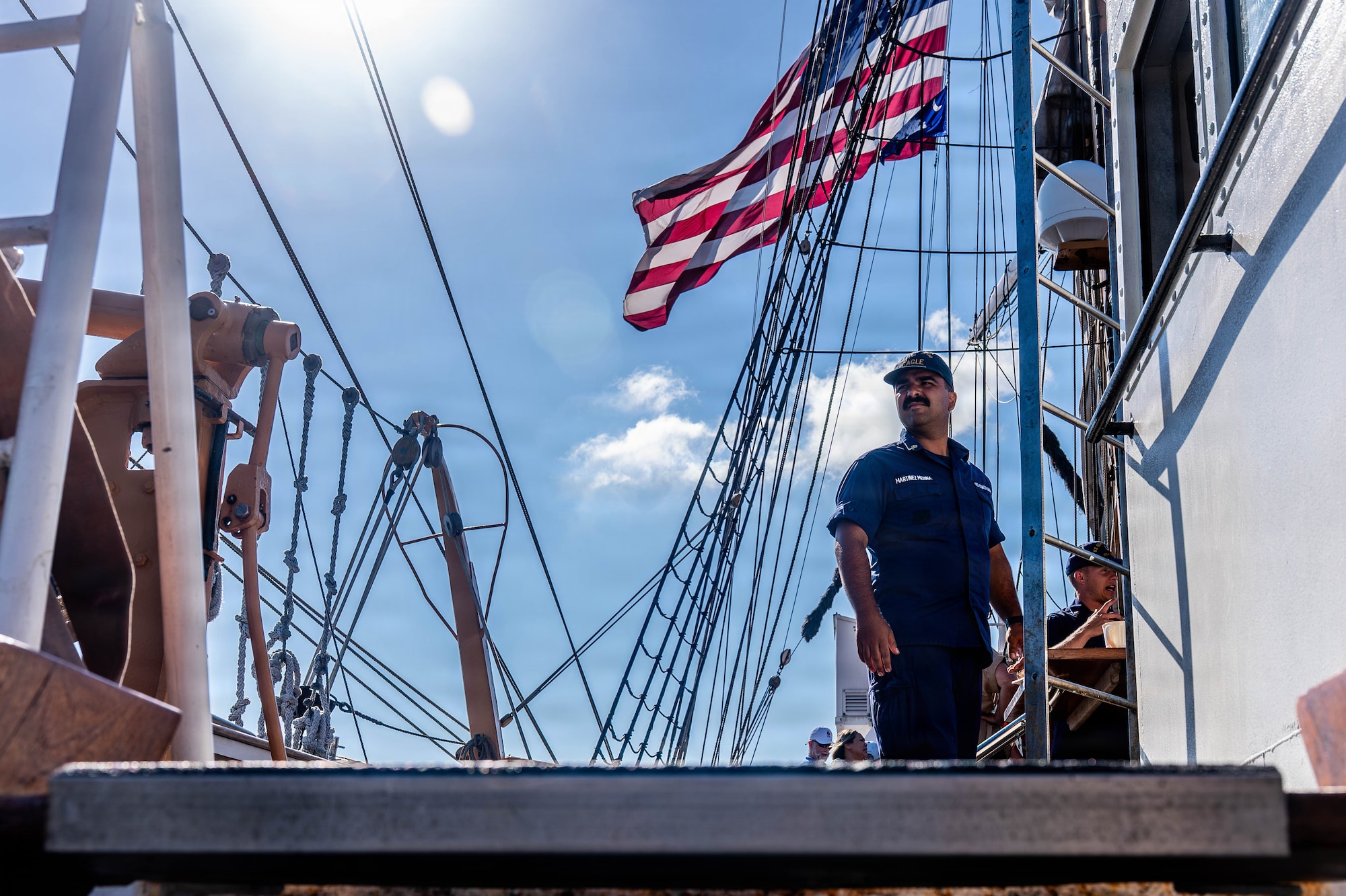 A photo of a Coast Guardsmen aboard the U.S. Coast Guard Cutter Eagle.