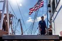 A photo of a Coast Guardsmen aboard the U.S. Coast Guard Cutter Eagle.