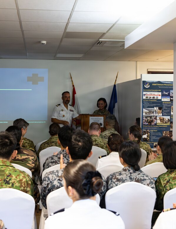 Lt. Col. Stephanie Grotzkey, a physician from 322nd Civil Affairs Brigade, presents a brief at the medical symposium during Exercise Marara 26 in Tahiti, French Polynesia, June 5, 2026.
