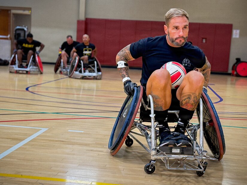 Retired U.S. Chief Warrant Officer 3 Jonathan Tallman, Team Army athlete and Ultimate Champion competitor, participates in wheelchair rugby practice at Team Army training camp ahead of the 2026 Warrior Games in San Antonio, Texas.