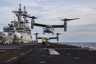 A U.S. Marine Corps MV-22B Osprey assigned to Marine Medium Tiltrotor Squadron (VMM) 163 (Reinforced), 11th Marine Expeditionary Unit, takes off during flight operations aboard Wasp-class amphibious assault ship USS Boxer (LHD 4) in the South China Sea, June 10, 2026.