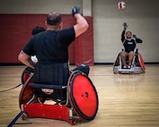 U.S. Army retired Sgt. 1st Class Valerie Watkins tosses the ball to a teammate during wheelchair rugby practice at the Army Team Sports Camp in San Antonio, Texas, May 5, 2026.