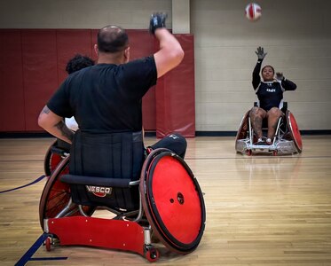 U.S. Army retired Sgt. 1st Class Valerie Watkins tosses the ball to a teammate during wheelchair rugby practice at the Army Team Sports Camp in San Antonio, Texas, May 5, 2026.