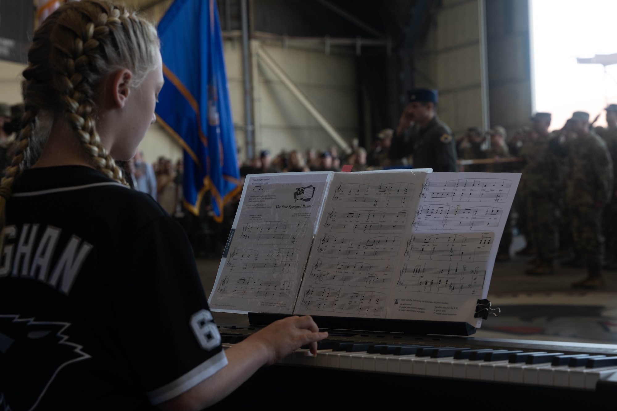 A child plays a piano.