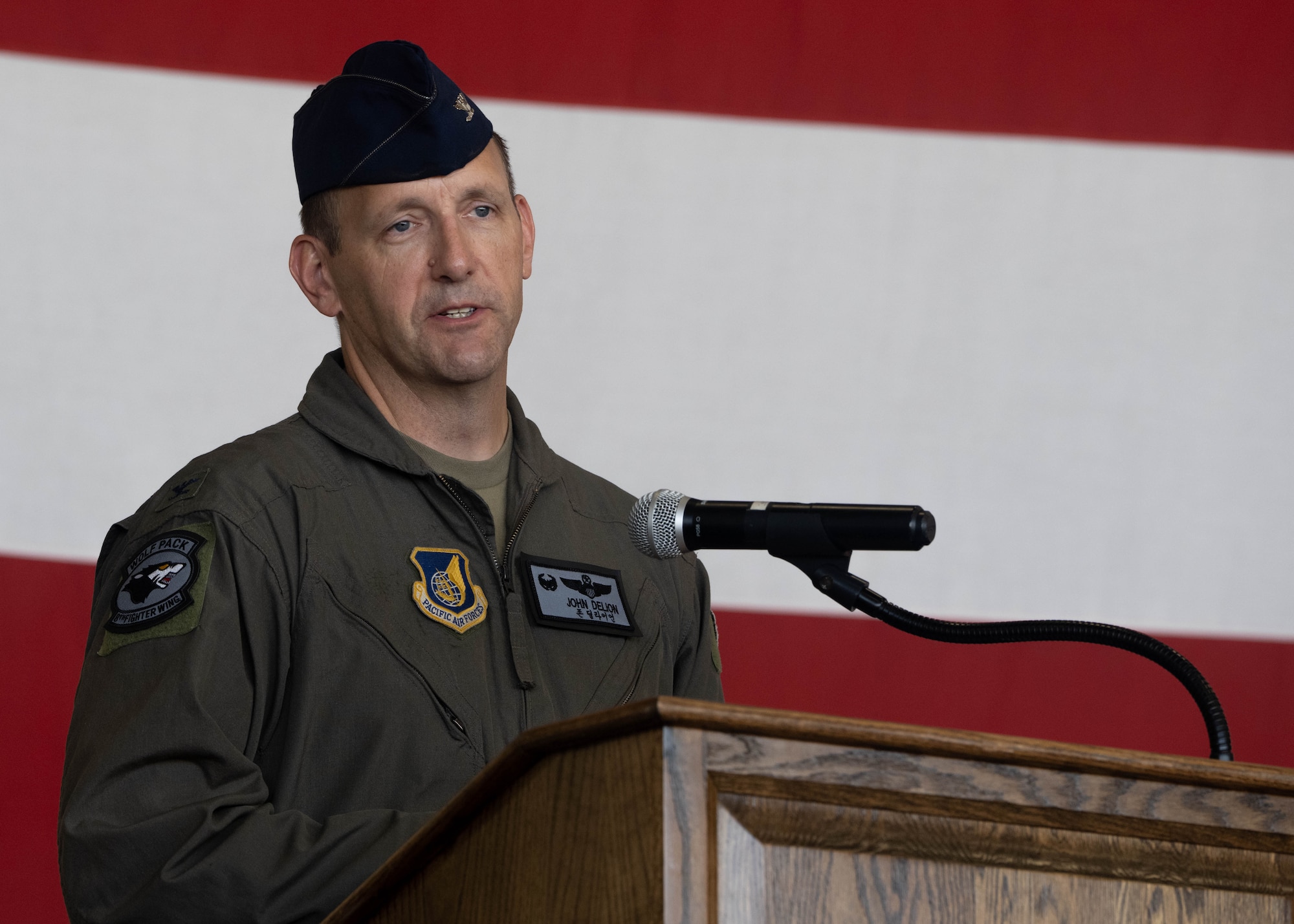 Commander gives remarks at ceremony.