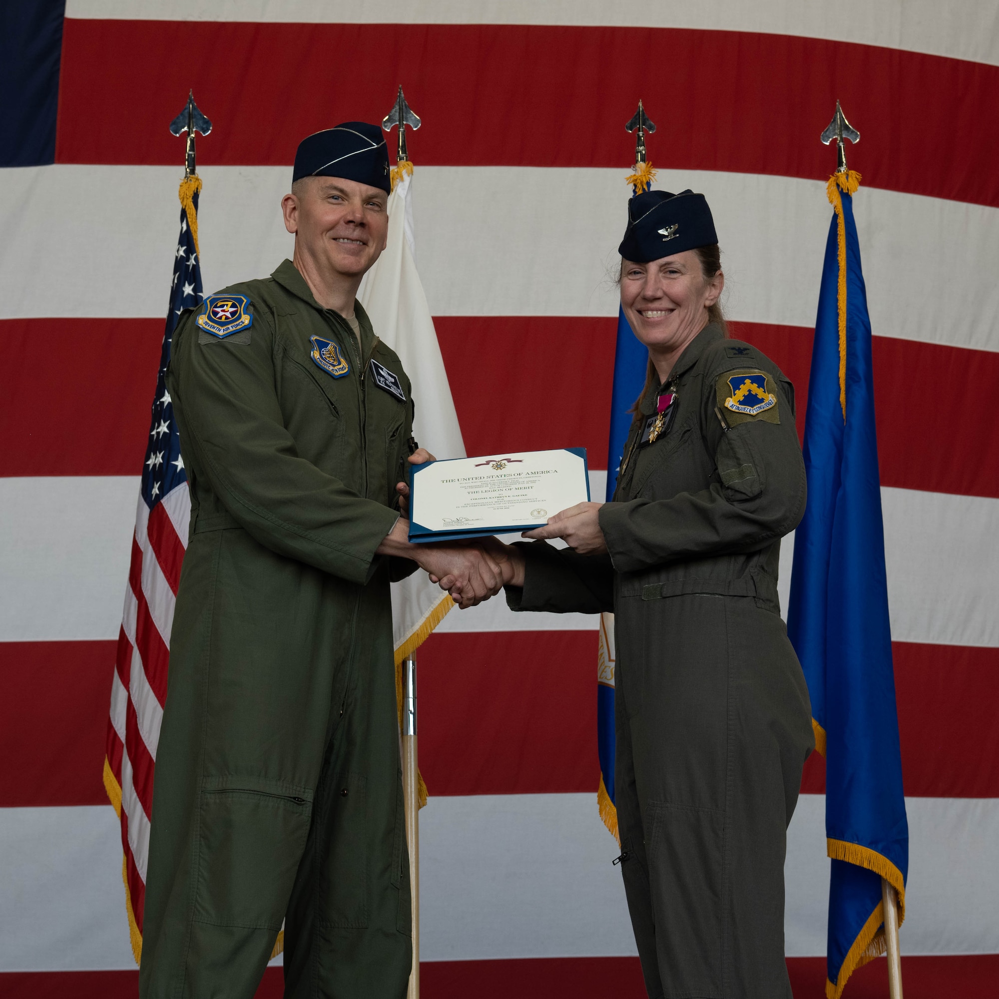 Commander receives medal.