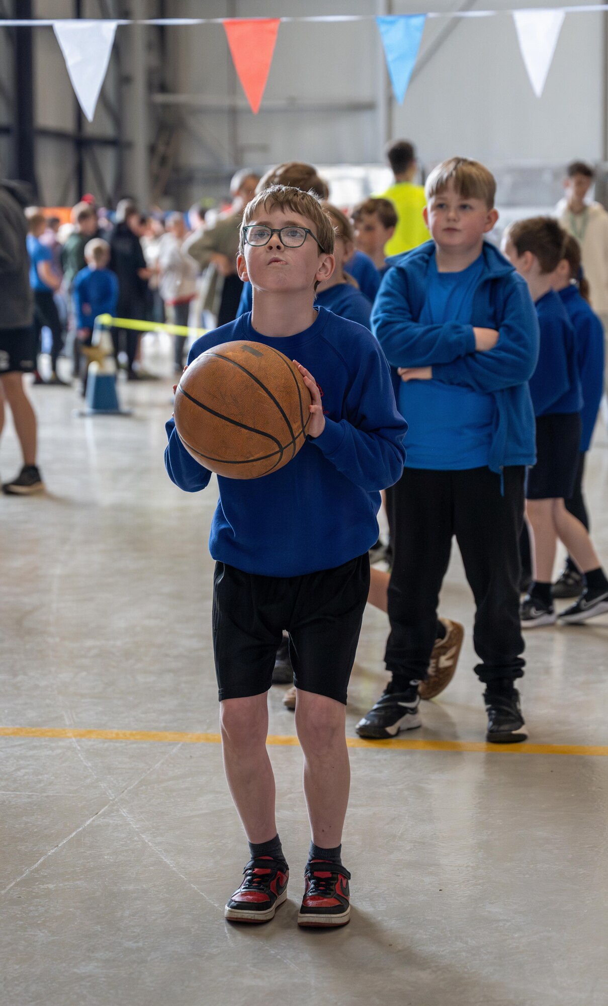 An athlete competes in basketball during Joan Mann Special Sports Day at RAF Mildenhall, England, June 4, 2026.