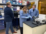 An end user loads a flow cell on a modified field sequencing device during Beholder’s Gaze training, Oct. 24, 2024. The event was attended by the U.S. Naval Research Laboratory and U.S. Army Combat Capabilities Development Command (DEVCOM) Chemical Biological Center military operators Far-Forward Advanced Sequencing Technology (F-FAST) team who conducted training and provided the technology/system. The effort brings sophisticated laboratory capability into austere environments, giving forward-deployed units the ability to detect and identify harmful pathogens in less than 30 minutes. Unlike conventional sequencing systems, Far-Forward Biological Sequencing (FFBS) is tailored for military personnel who may not have formal laboratory training. (U.S. Navy photo)