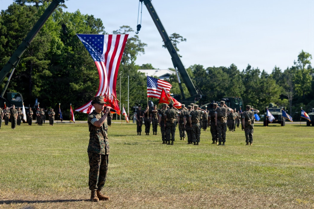 U.S. Marine Corps Cpl. Arayah Tindall, a logistics specialist with Combat Logistics Regiment 27, 2nd Marine Logistics Group, sings the national anthem during a change of command ceremony at Marine Corps Base Camp Lejeune, North Carolina, June 11, 2026. The change of command ceremony is a time-honored tradition which formally signifies the transfer of command and entails the total accountability, authority and responsibility from one individual to another. Tindall is a native of Michigan. (U.S. Marine Corps photo by Sgt. Rafael Brambila-Pelayo