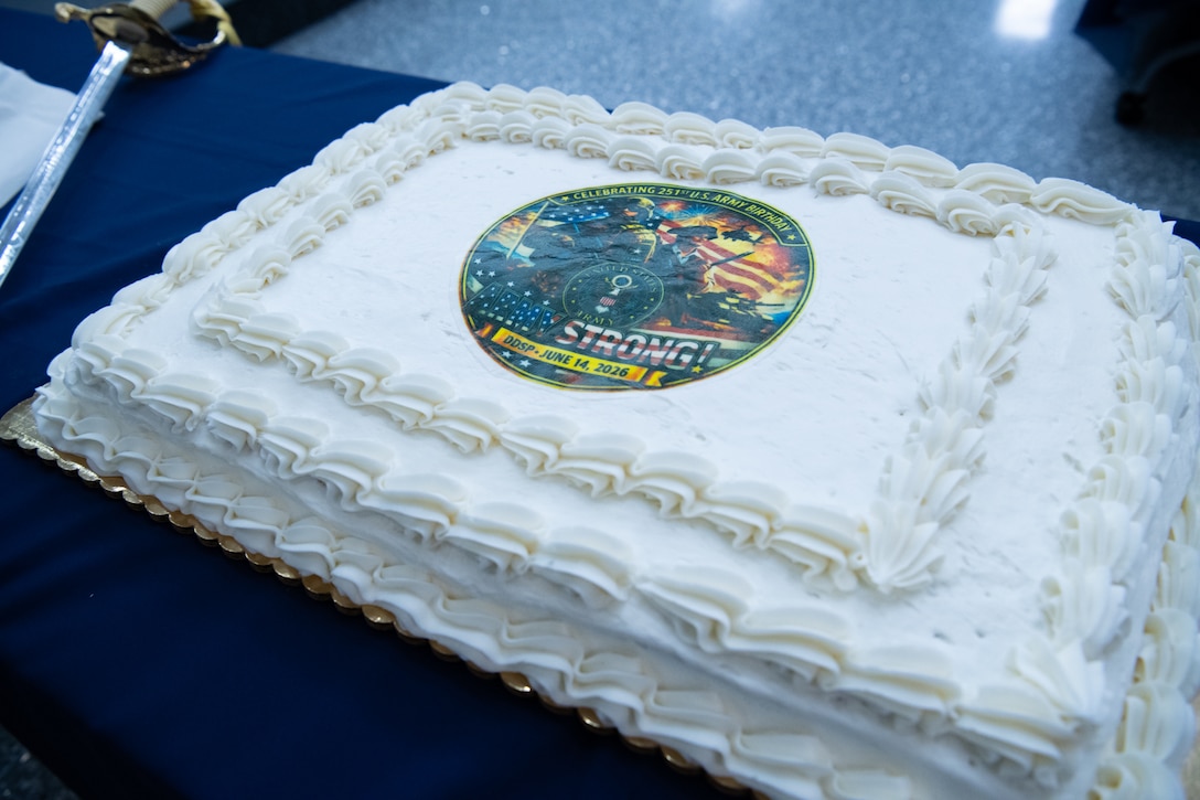 A cake sits on a table.