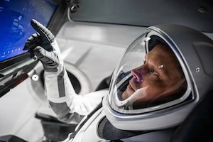 NASA astronaut Bob “Farmer” Hines trains inside a mockup of the Crew Dragon vehicle at SpaceX Headquarters in Hawthorne, Calif., Feb. 15, 2022. An Air Force test pilot with more than 4,000 flight hours across 50 aircraft types, Hines served as the pilot for NASA’s SpaceX Crew-4 mission as part of the agency’s Commercial Crew Program. NASA has selected Col. Hines to train with its prime crew for Artemis III as an alternate crew member. (Photo courtesy of NASA)