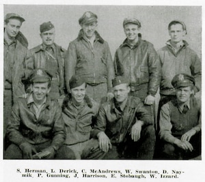 P-47 Thunderbolt pilots of the 404th Fighter Squadron, 371st Fighter Group pose for a picture during World War II.  Flight Officer Wesley R. “Bob” Izzard, postwar author of the book Winged Boot, is pictured at bottom right in the sweater vest. (The Story of the 371st Fighter Group in the ETO)