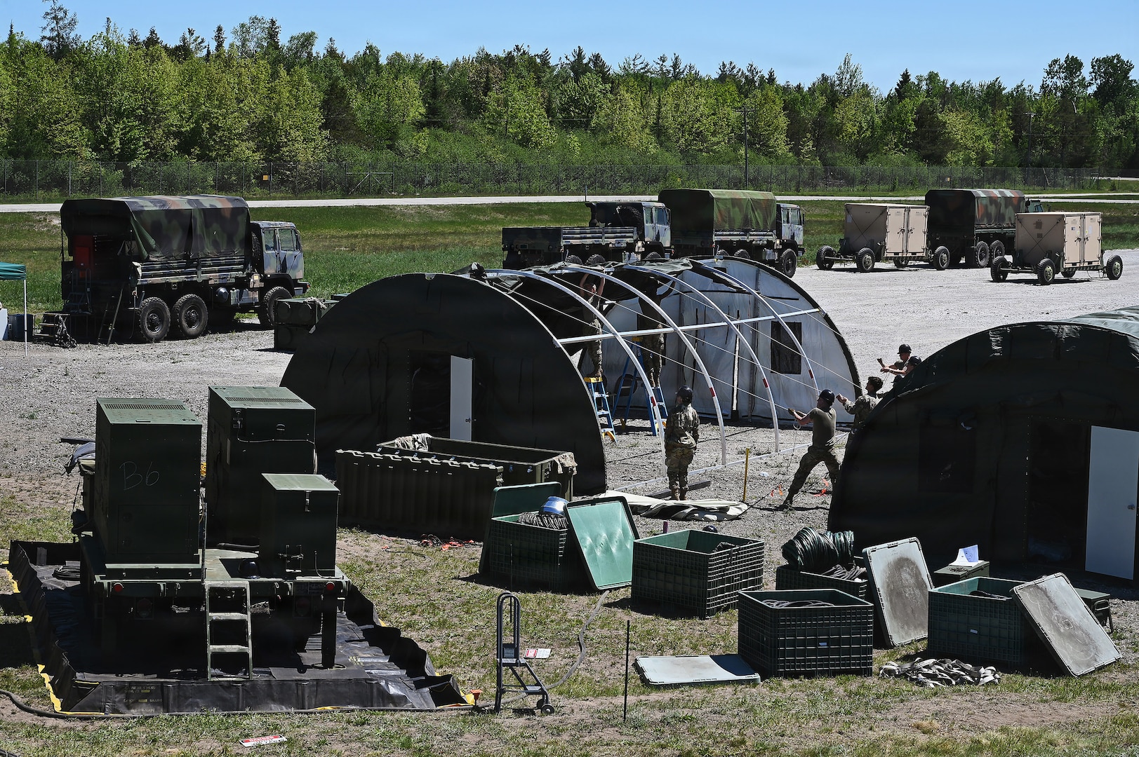 Airmen assigned to the 123rd Air Control Squadron set up tents June 1, 2026 for a field training exercise at the Alpena Combat Readiness Training Center in Michigan.
