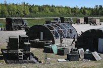 Airmen assigned to the 123rd Air Control Squadron set up tents June 1, 2026 for a field training exercise at the Alpena Combat Readiness Training Center in Michigan.