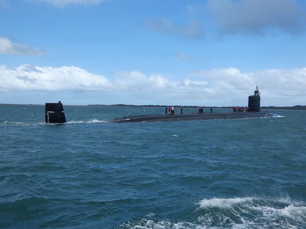 GARDEN ISLAND, HMAS Stirling, Western Australia, Australia (October 29, 2025) – USS Vermont (SSN 792) arrives at HMAS Stirling, Western Australia on Oct. 29, as part of a scheduled port visit before a planned submarine maintenance period (SMP). The SMP showcased Pearl Harbor Naval Shipyard & Intermediate Maintenance Facility’s ability to conduct maintenance in Western Australia and its training of Australian maintainers to support the establishment of Submarine Rotational Force – West as early as 2027 as part of AUKUS Pillar I, the trilateral security agreement between Australia, the United Kingdom and the United States. The AUKUS I&A Program Office is the U.S. Navy office responsible for executing the trilateral partnership to assist Australia in acquiring conventionally armed, nuclear-powered attack submarines at the earliest possible date while setting the highest nuclear stewardship standards and continuing to maintain the highest nonproliferation standard. (U.S. Navy Photo by Ashley Calingo)