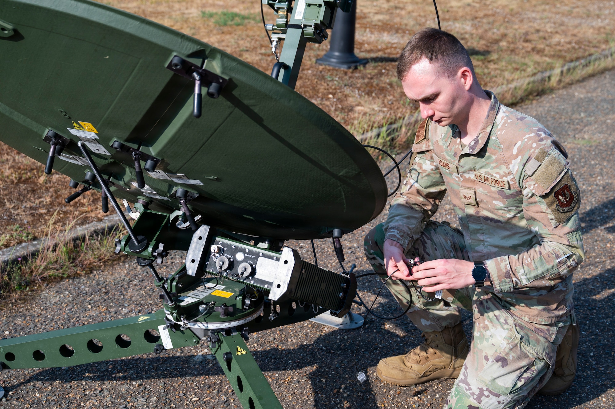 U.S. Air Force Senior Airman Kailan Adams, 606th Air Control Squadron network operations technician, assembles a ranger satellite communication terminal in preparation for exercise Astral Knight 2026 at RAF Lakenheath, England, May 27, 2026.